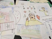 Get-well cards from schoolchildren to Pope Francis are seen at the Vatican, Sunday, Feb. 23, 2025