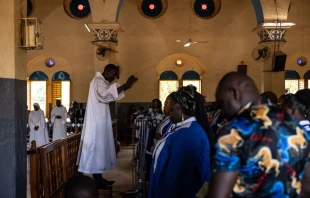 Worshippers attend a Mass at Ouagadougou's Catholic cathedral on June 12, 2022, in Burkina Faso. The country has been grappling with Islamist terrorism since 2015 and Christian communities live in fear of furhter attacks. Credit: OLYMPIA DE MAISMONT/AFP via Getty Images