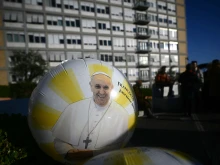A balloon with an image of Pope Francis is pictured outside the Gemelli University Hospital in Rome, where Pope Francis is hospitalized with pneumonia, on March 3, 2025.